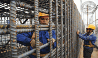 Steel fixers in construction site