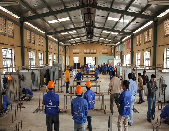 Workers gather before the trade test